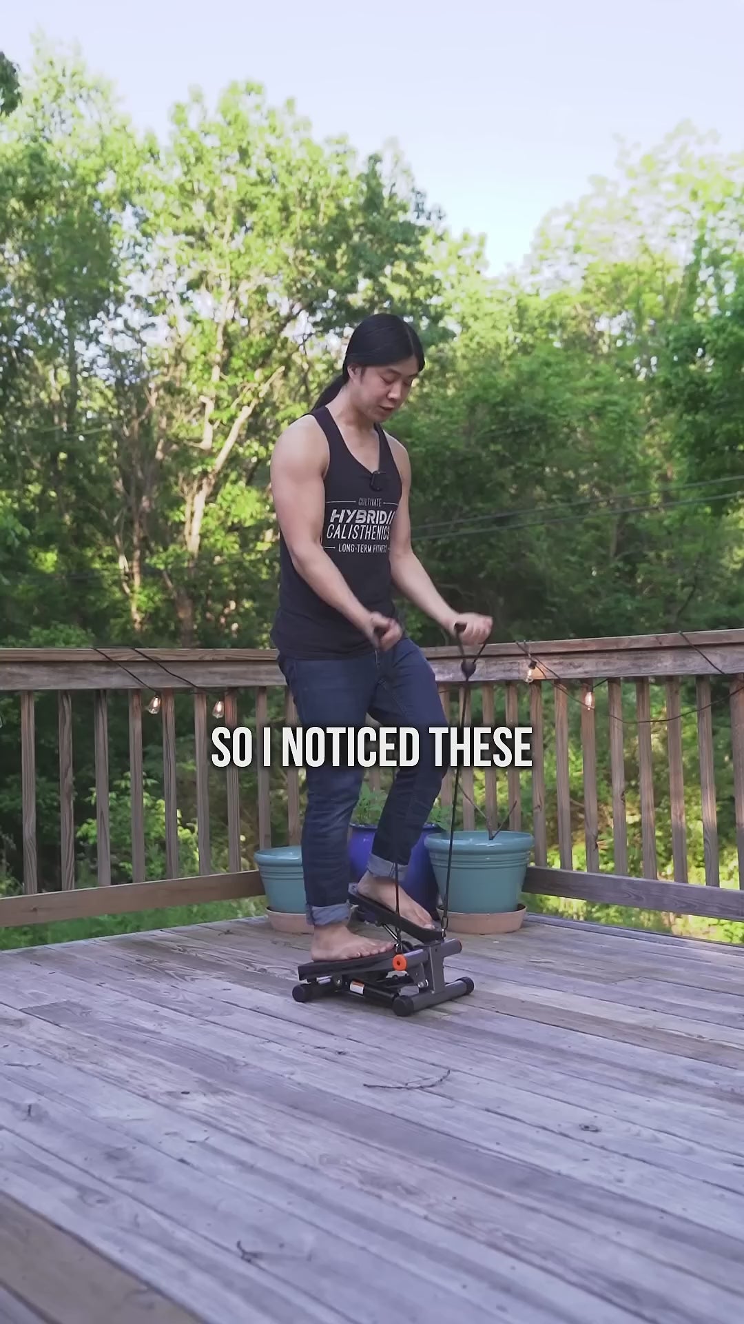 Person using multi-function stepper machine for cardio workout at home